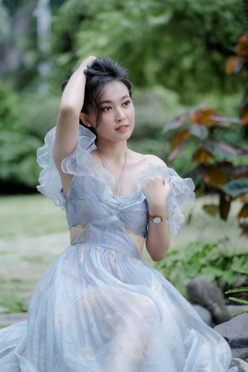Woman in a Lavender Dress Sitting · Free Stock Photo