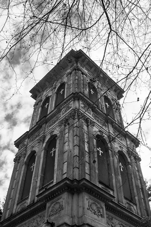 Grayscale Photo of a Church Tower