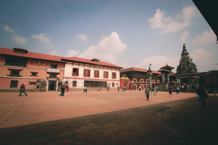 People On Square Near Temple