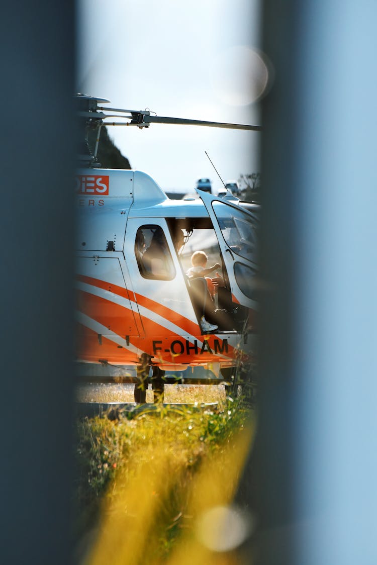 View Of A White And Orange Helicopter