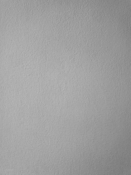 Darmowe zdjęcie z galerii z biała ściana, biały, pionowy strzał
