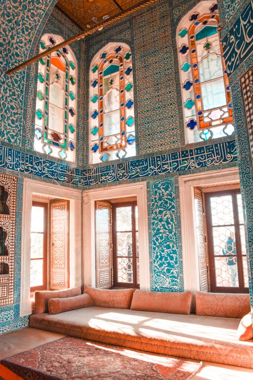 Free Beautifully ornamented room in Topkapi Palace showcasing Ottoman architecture and stained glass windows. Stock Photo