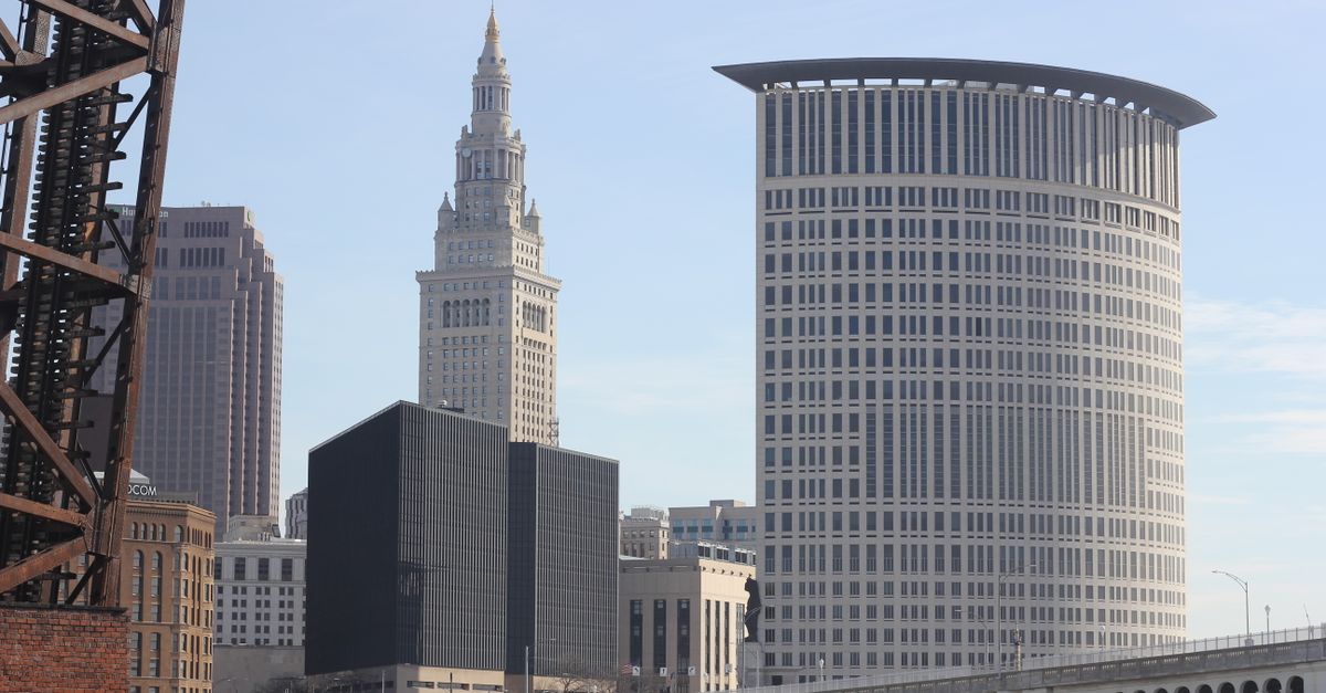 A clear day view of Cleveland's skyline featuring modern skyscrapers and historic architecture.