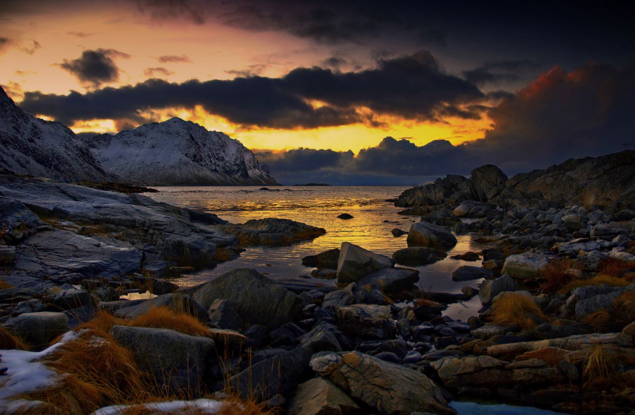 breathtaking view of nordland s rugged coast with snowy mountains and