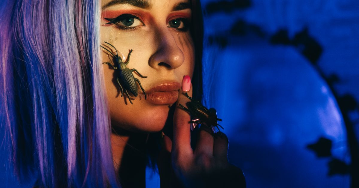 A Woman Posing with Insects · Free Stock Photo