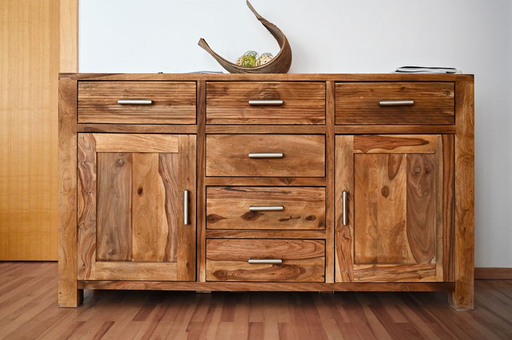 Wood grain entrance cabinet inspiration with warm storage drawers
