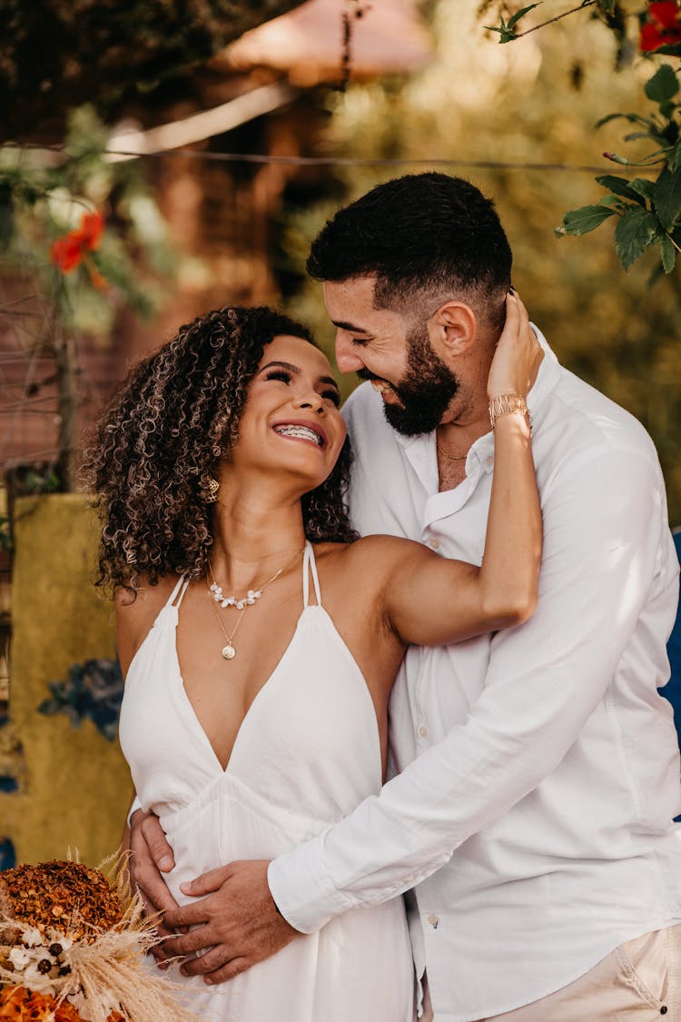 Newlyweds Looking Each Other Into Eyes