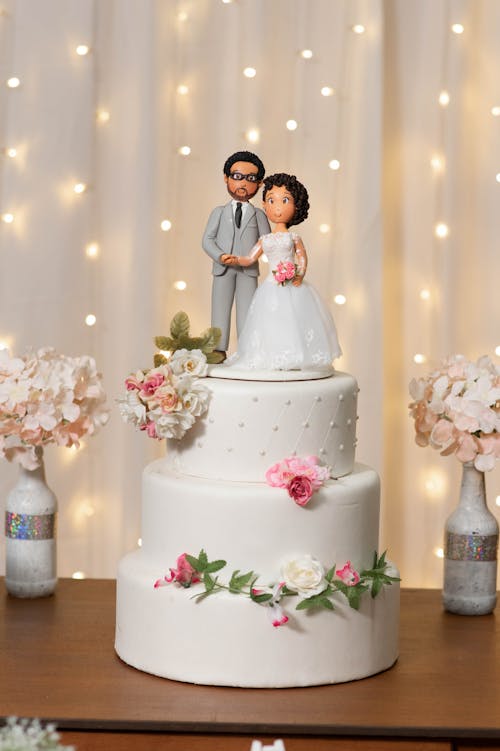 Free A Bridal Cake with Couple Figurines  Stock Photo
