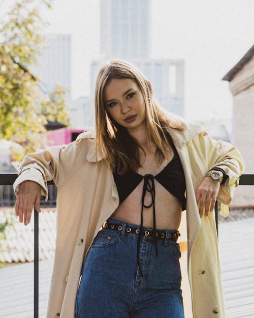 Woman Posing on Metal Railing