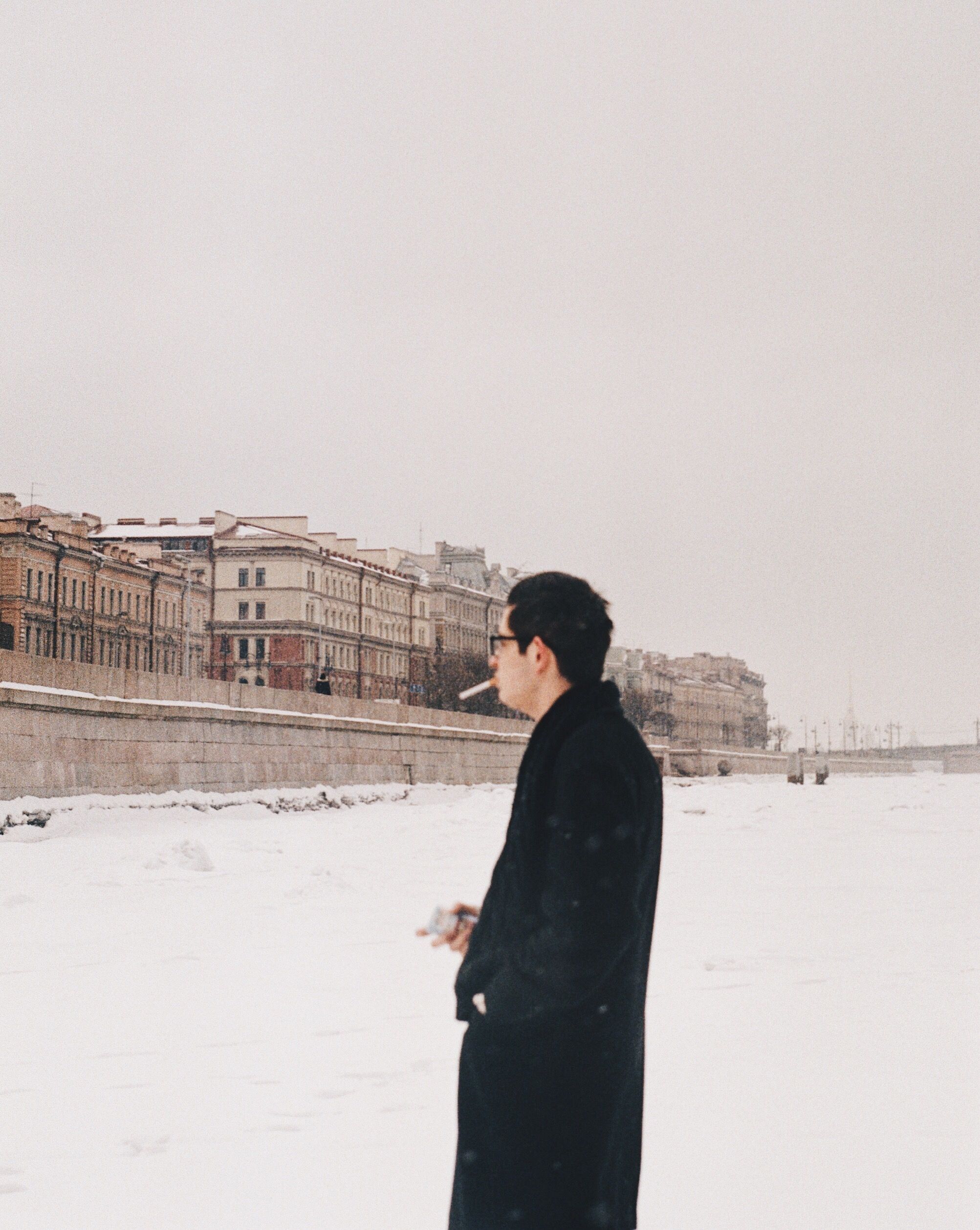 smoking cigarettes in cold weather Man Smoking Cigarette During Winter · Free Stock Photo