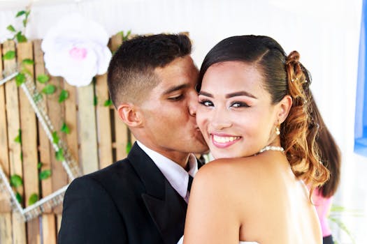 Man in Suit Kissing Woman in Cheek