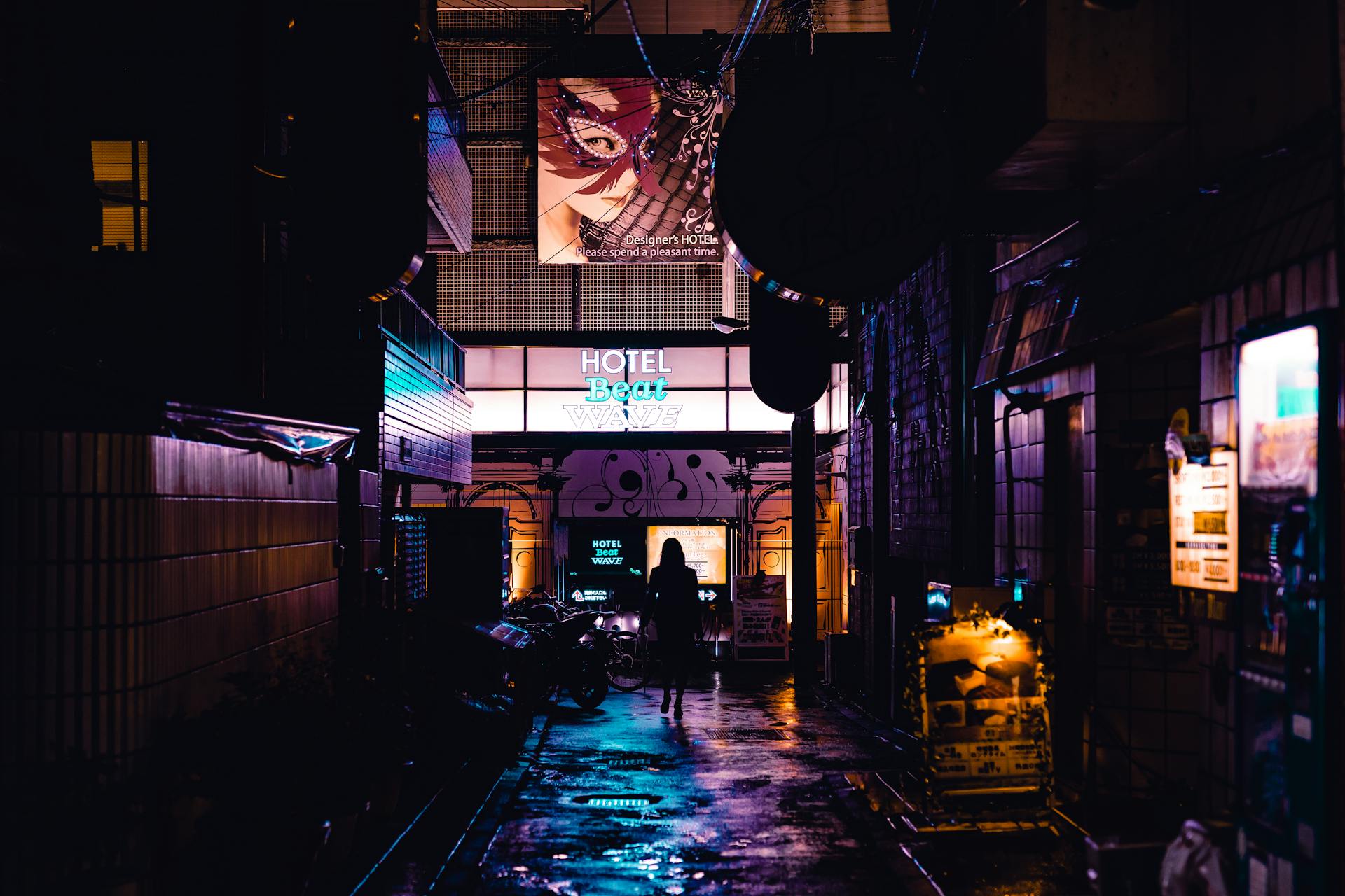 Person Standing Near Hotel Door