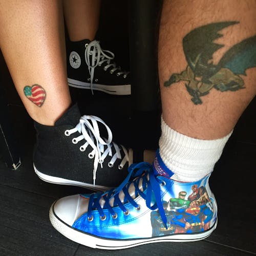 Free stock photo of sneakers, superhero, tattoos