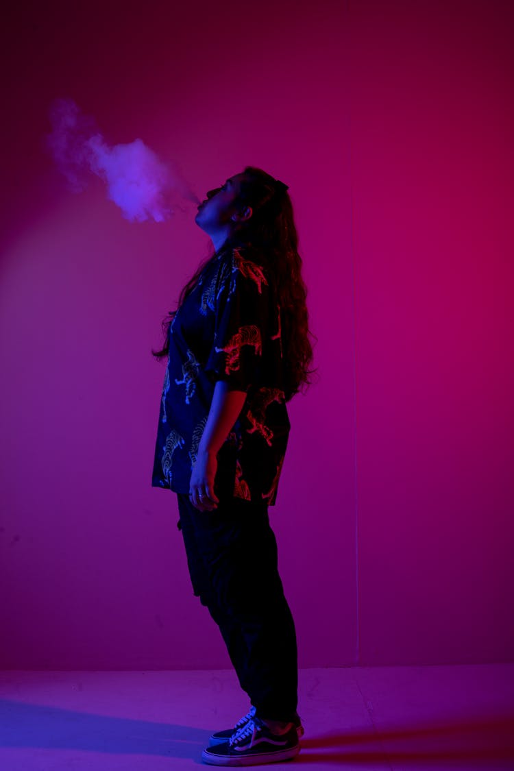 
A Woman Blowing Smoke