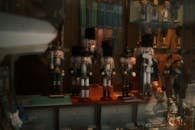 Nutcracker Toys Behind the Glass Wall of a Store