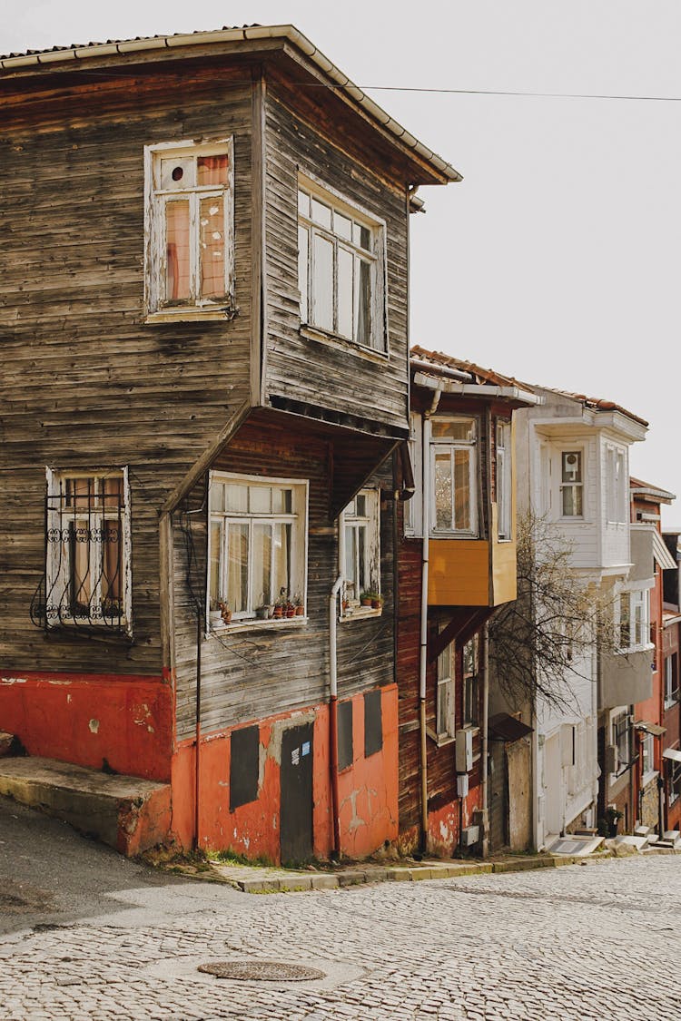 Beautiful Houses Near An Alleyway On The Neighborhood