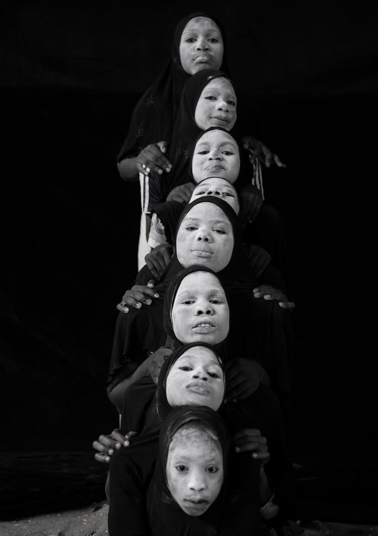 Group Of Women With Powdered Faces