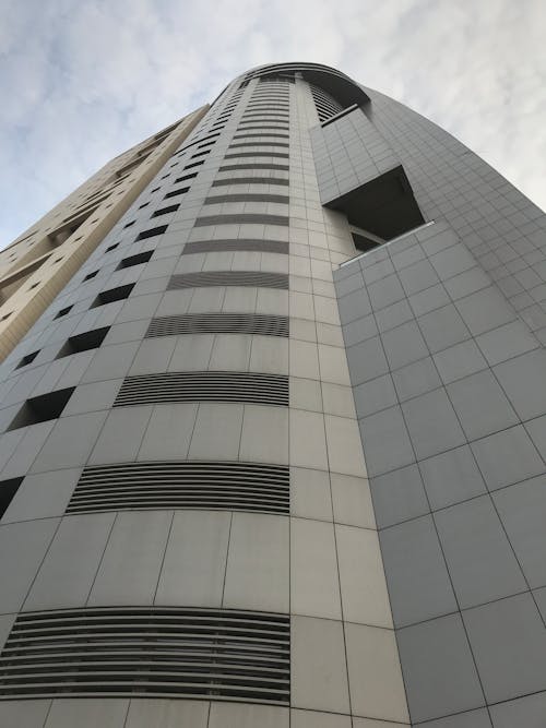 Бесплатное стоковое фото с вертикальный выстрел, здание, небоскреб