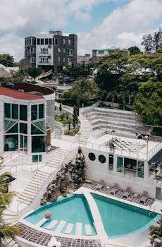 Aerial view of a contemporary resort with pools and lush greenery in Altotonga, Veracruz, Mexico.