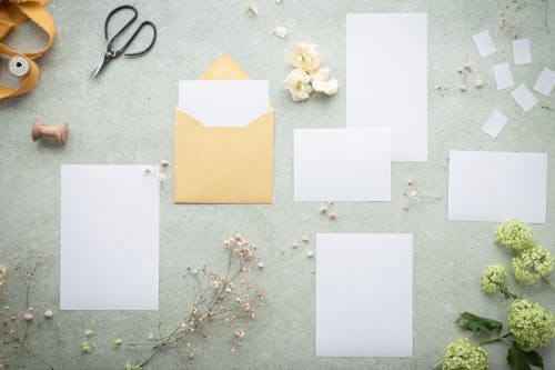 Envelope, Paper Sheets and Flowers