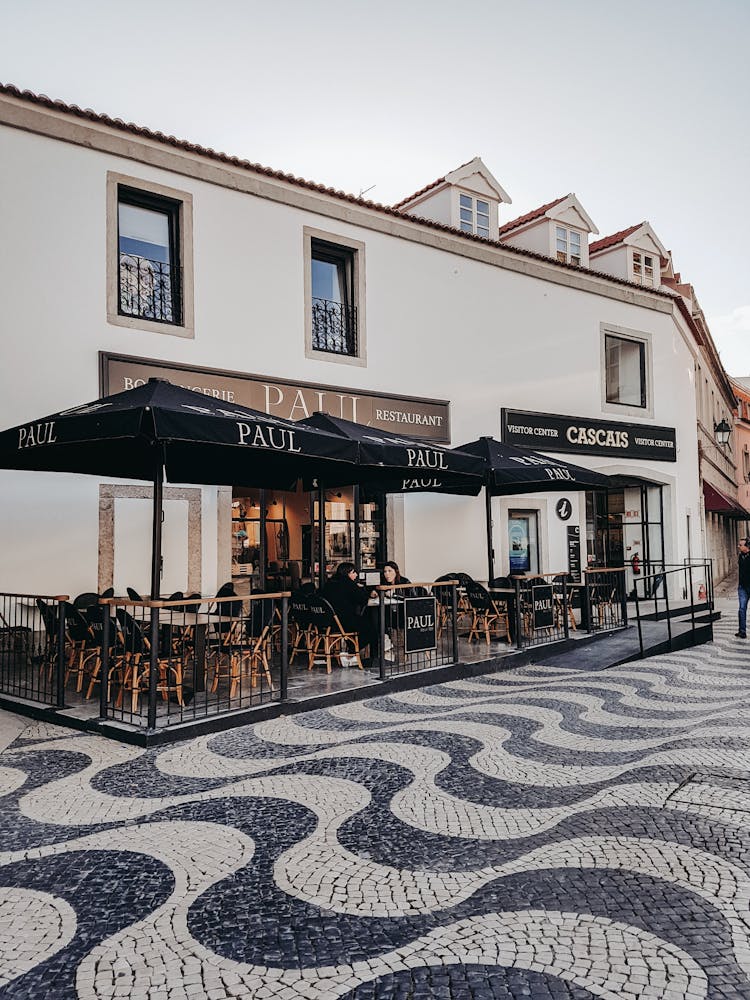 Women Dining Al Fresco At Paul Café In Portugal