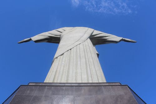 Free Low angle view of Christ the Redeemer statue with clear blue sky in Rio de Janeiro. Stock Photo