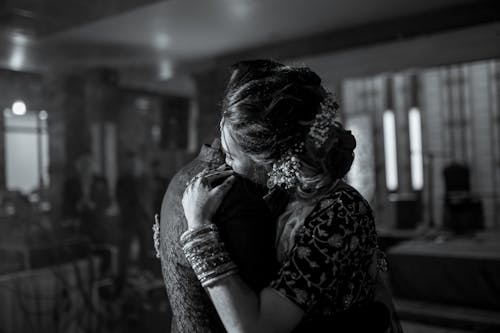 Black and White Photo of Couple Slow Dancing