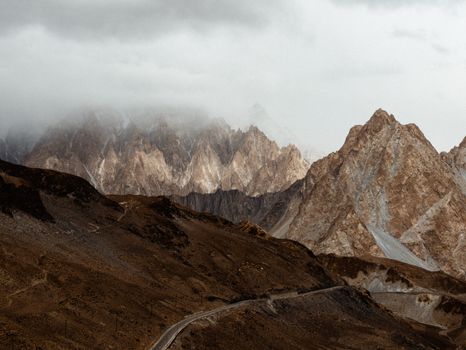 Explore the rugged beauty of Hunza Nagar's rocky mountain range. Perfect for nature lovers.