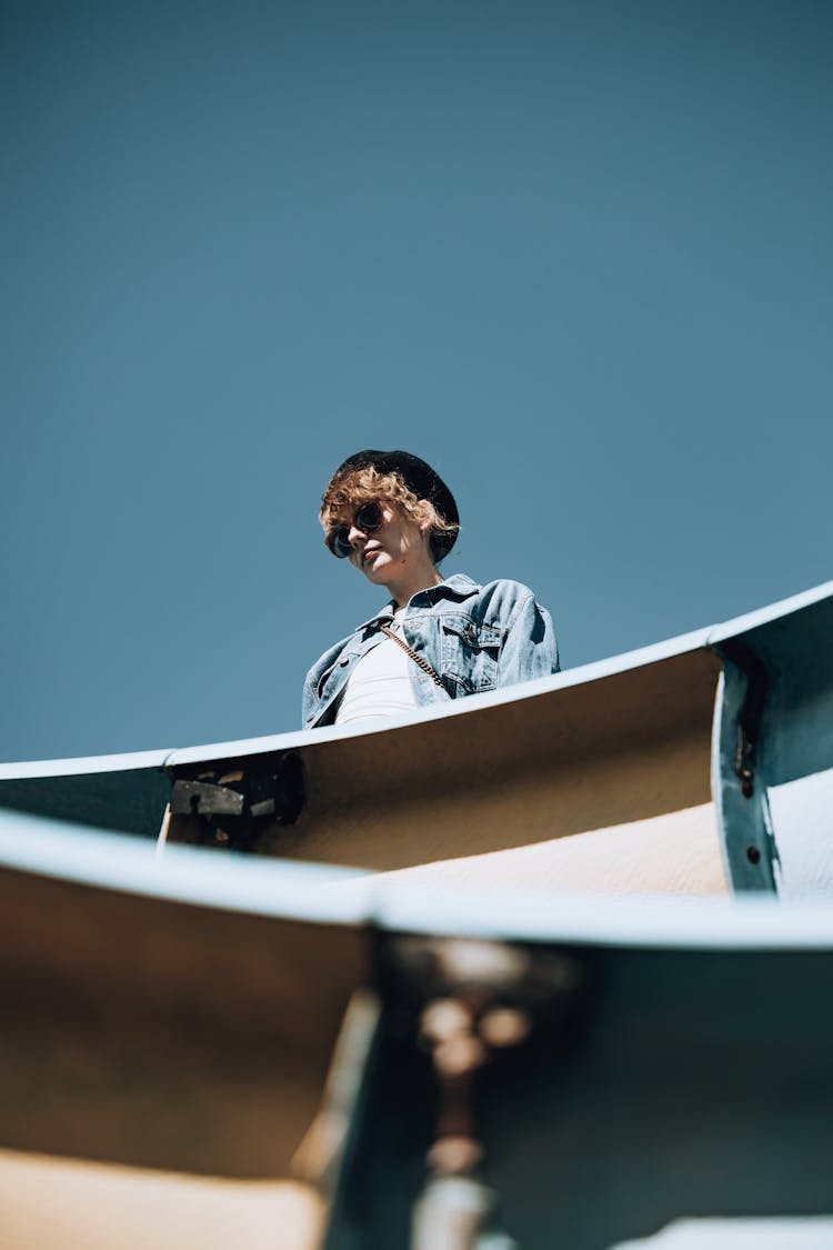 Woman In Denim Jacket On Boat