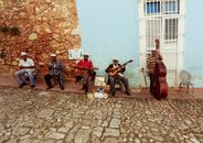 People Playing Musical Instruments on Street