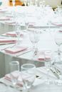 Round Tables Arranged in White and Pink for Wedding Party