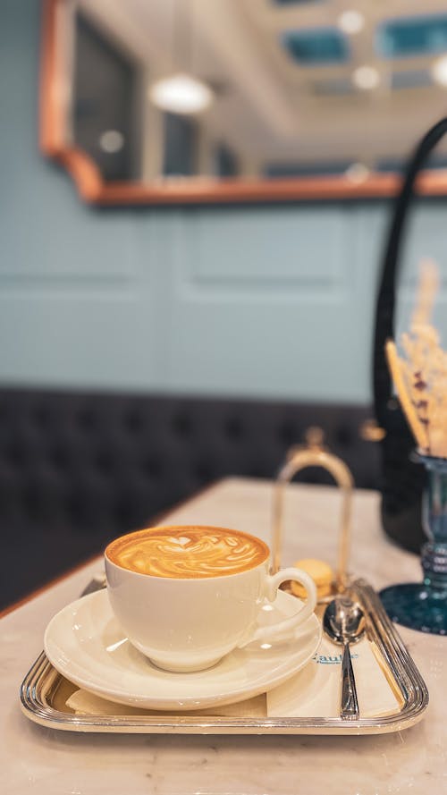 Free Cup of Coffee on a Saucer Stock Photo