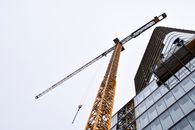 Crane and building under construction , modern
