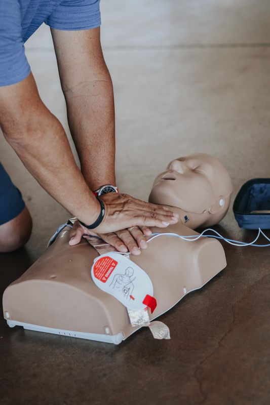 Hands performing CPR