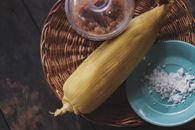Yellow Corn on Brown Rattan Plate