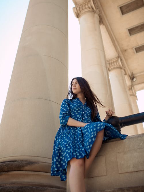 Low Angle Photo of Woman wearing Blue Dress