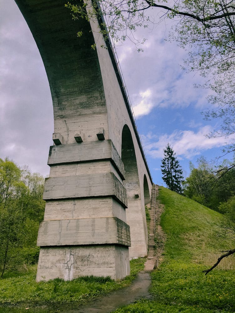 Low Angle Shot Of A Concrete Bridge With Arches