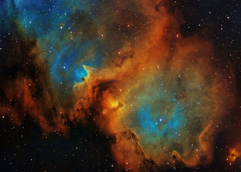 Vivid abstract image of a colorful nebula in the cosmos, showcasing space's beauty.