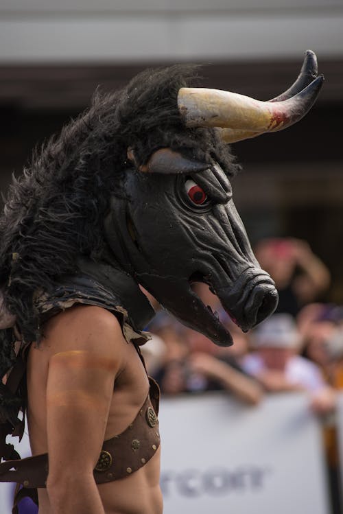 Person Wearing Black Bull Mask