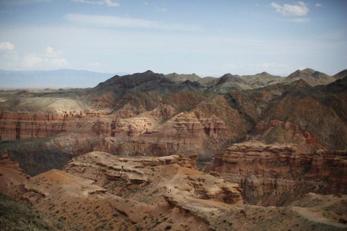 Free Breathtaking view of a desert canyon with unique eroded rock formations. Stock Photo