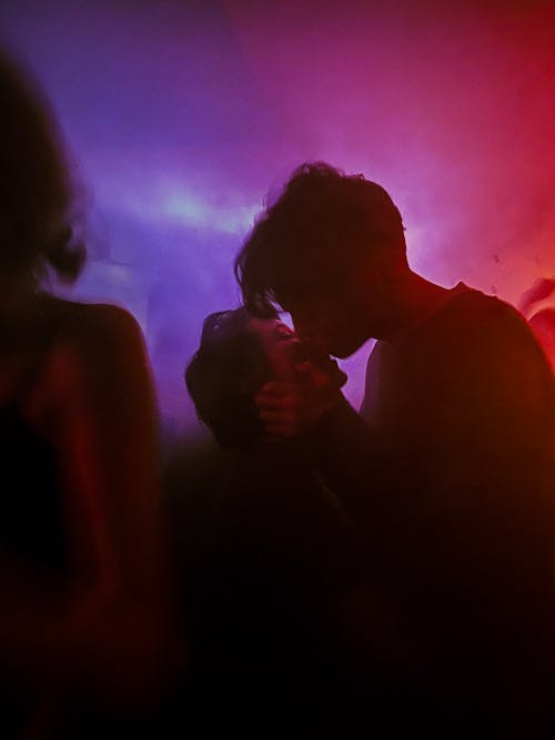 A Couple in a Passionate Kiss · Free Stock Photo