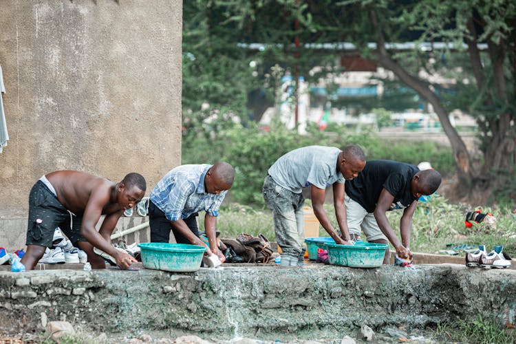 Men Cleaning Shoes