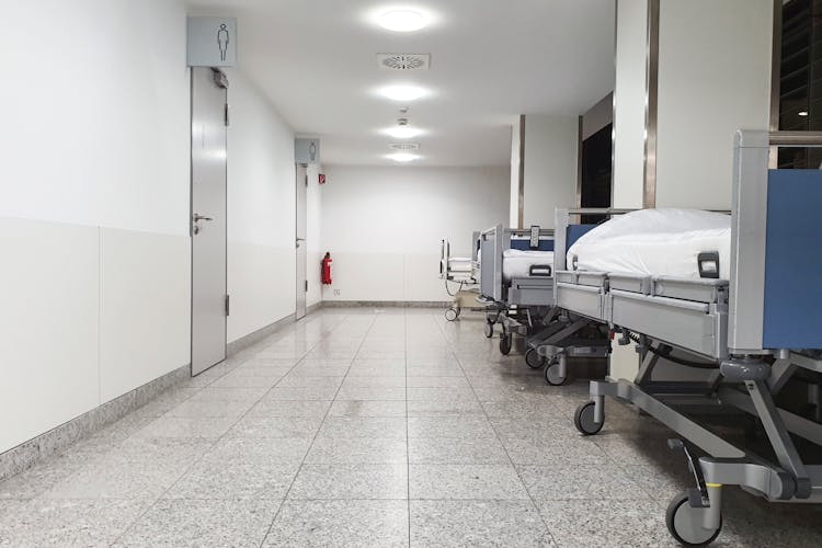 Hospital Beds In The Hallway	