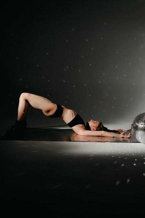 Woman in Underwear Dancing on the Floor