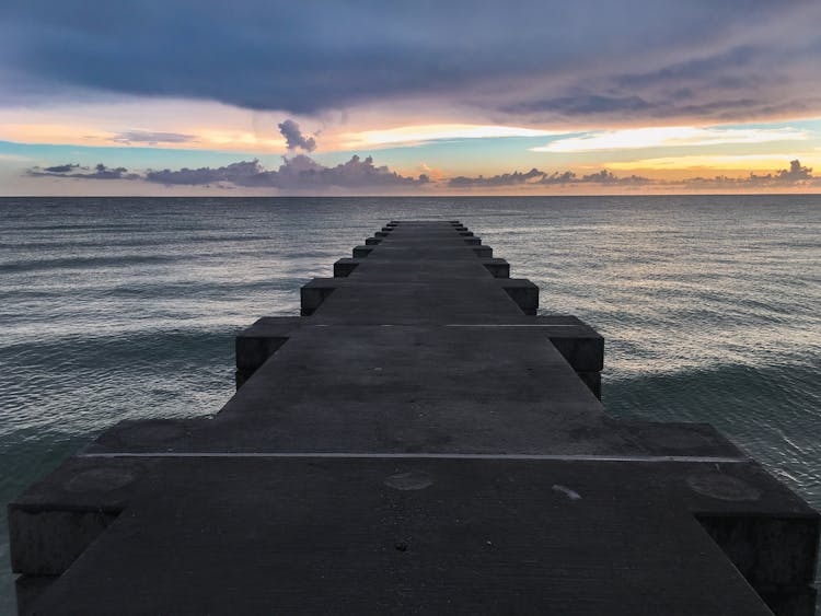 Pier Onto The Sea At Dawn