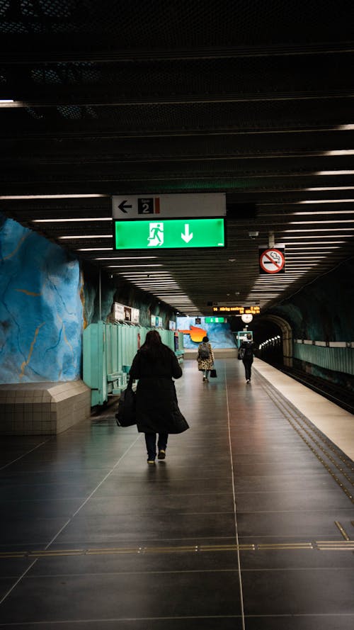 People Walking on the Train Station