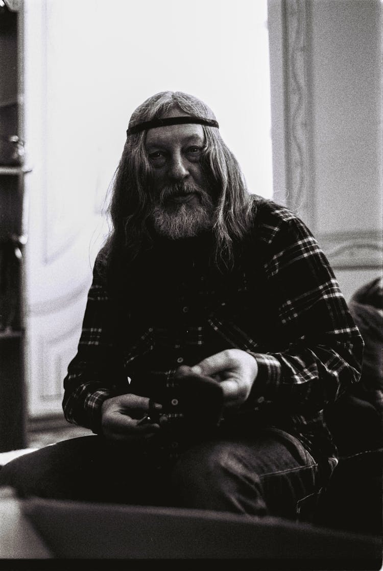 Black And White Portrait Of Old Hippie