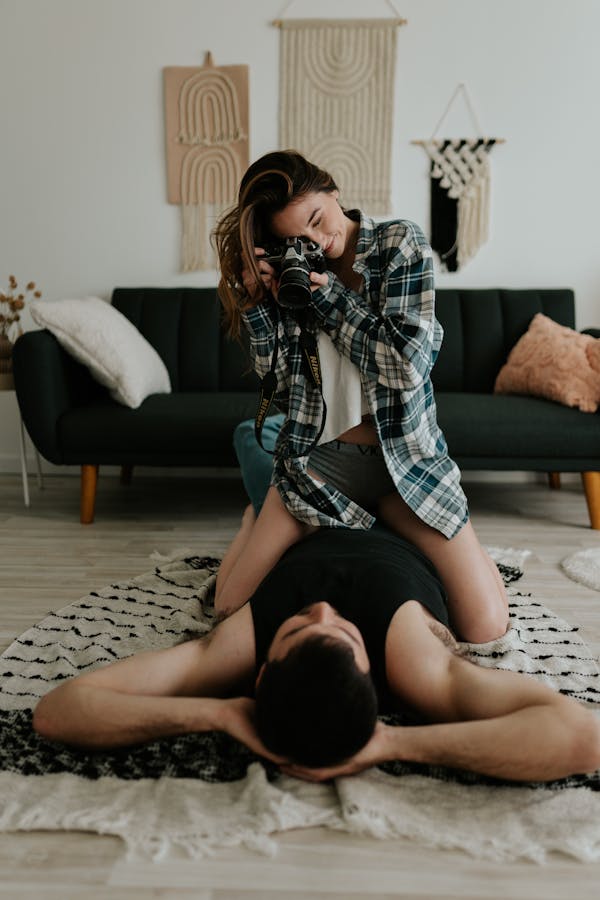 Woman Taking Photo of her Partner 