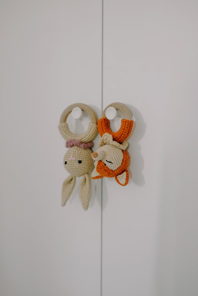 Crotchet Baby Toys Hanged On Wall