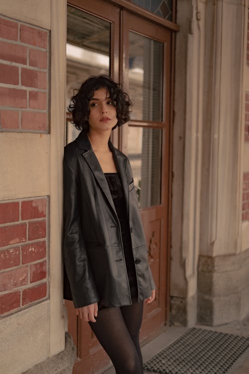 Portrait of a Woman Standing Outside a Building